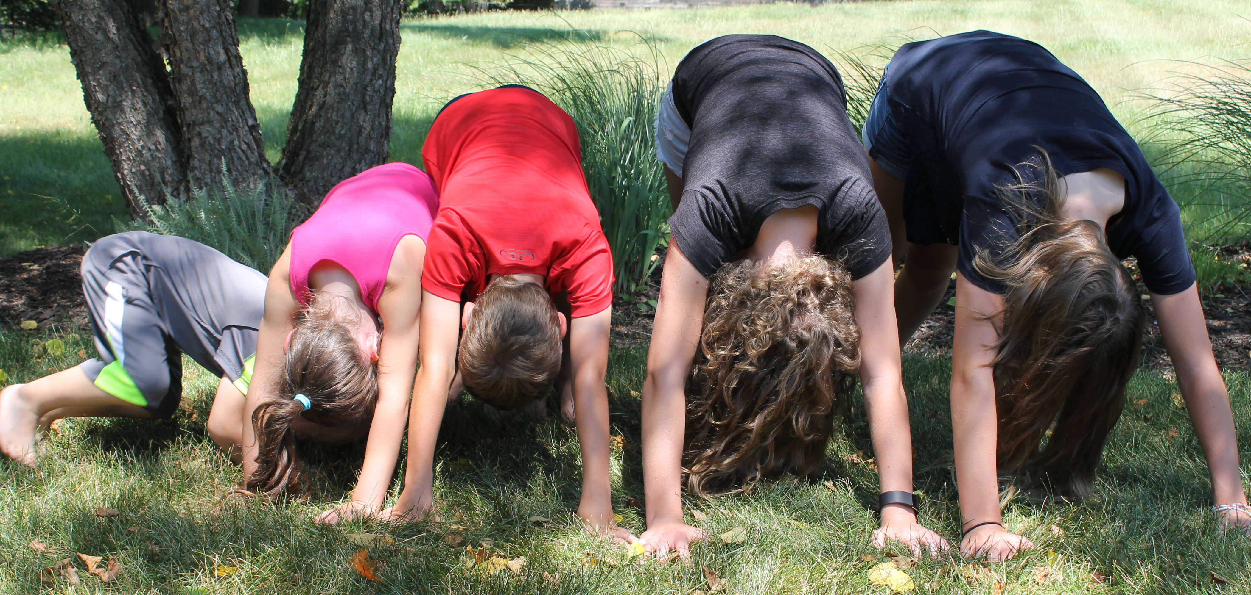 Beginner's Guide to 4-Person Yoga Poses | The Yoga Funk